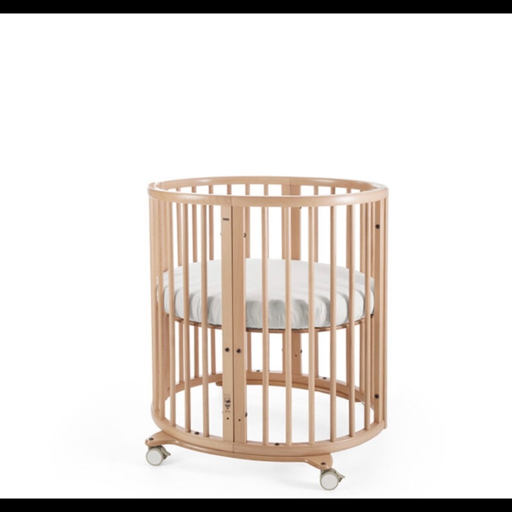 Stokke® Sleepi™
The oval mini crib in Neutral with Pehr Canopy